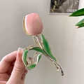 Detail view of pink tulip hair claw clip with gold alloy base and enamel petals - L00 Pink Tulip Green Leaf