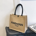 Large capacity linen tote bag in light brown with black rope handles and FINEMOUS print - FINEMOUS