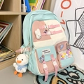 Pastel multi-color school backpack in mint green and pink with cute charms - Backpack with Charms and Badges / Green