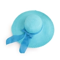 Close-up of blue woven straw sun hat showing fine spiral texture and ribbon bow detail - Sky Blue