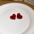 Detail of glossy burgundy heart stud earrings with a polished finish on white tray - Dark Red Heart (Silver Pin)