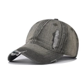 Detailed macro view of distressed denim fabric and ripped holes on vintage baseball cap - Adjustable / Green