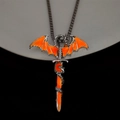 Close-up of silver dragon and sword pendant with glowing orange wing detail - Orange Light