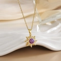 Macro shot of gold sun pendant necklace with purple opal center and zircon accents - Purple Opal Sun Pendant (XL0304B)