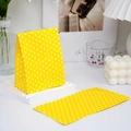 Mini bright yellow paper gift bag with white polka dots for candy and small party favors - Yellow with White Dots
