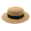 Detail of elegant boater straw hat with black ribbon and gold M logo emblem - Khaki