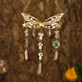Close-up of golden butterfly suncatcher with crystal prisms and mushroom beads - Gold Wings + Clear Quartz