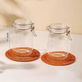 Set of two 1000ml airtight glass storage jars with metal clamps on straw mats - 2-Piece Set / 1000ml