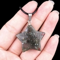 Star-shaped mixed stone pendant with dark gray resin and silver clasp on black cord - 30mm African Bloodstone