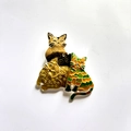 Artistic stacked cats enamel brooch featuring vibrant yellow green and orange patterns - Yellow Cat