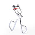 Silver stainless steel eyelash curler with protective red silicone pad for natural curl - Silver