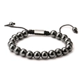 Handmade woven hematite bead bracelet with adjustable cord on white background - Hematite D