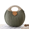 Army green woven straw handbag with white circular handles and brown leather flap detail - Army Green