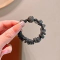 Sparkly black mesh hair tie with silver glitter and a decorative rhinestone ball charm - Organza Hair Tie
