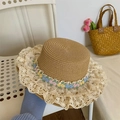 Straw sun hat with white lace trim and handmade colorful crochet floral decorations - Three-Color Lace Straw Hat Khaki