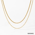 Double-layered golden stainless steel bead and rope chain jewelry set on white background - Gold Double Layer Combined Necklace (KDD892)