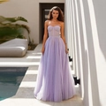 Lavender strapless tulle ball gown featuring a structured corset bodice and layered skirt - US size 2 (S) / Purple