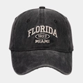 Macro detail of Florida 1822 Miami embroidery on washed cotton baseball cap - Adjustable / Black