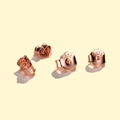 Four rose gold S925 sterling silver butterfly earring backs on a clean yellow background - 4mm 925 Silver Rose Gold Plated / 1 Pair