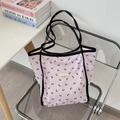 Pink large-capacity tote bag with black bow prints and contrasting shoulder straps - Purple