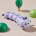 Simpatica carota viola a molla con corpo segmentato per il divertimento dei bimbi - Bruco / Viola