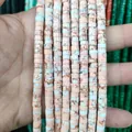 Close-up of marble textured cylindrical stone beads for DIY jewelry making - Imperial Jasper 16