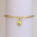 Golden paperclip chain bracelet with an octagonal crystal-encrusted letter J pendant - Letter J