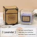 Lavender scented candle in clear glass jar with matching gold and black gift box packaging - Purple Lavender