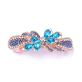 Detailed view of a rose gold hair clip with sparkling blue and clear crystal flowers - Style F / Blue