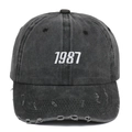 Détail de la casquette délavée gris anthracite avec broderie 1987 et bordure usée - Noir Vieilli
