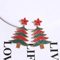 Detailed view of handmade beaded Christmas tree earrings in festive red and green colors - Green & Red Christmas Tree With Star Top
