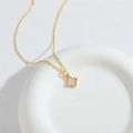 18K gold four-leaf clover necklace with pink mother-of-pearl inlay on white stone tray - Four-Leaf Clover / Gold