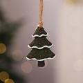 Detail of resin Christmas tree ornament with white edges and rustic jute hanging rope - Style 10 (Christmas Tree)