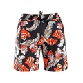 Détail du short de plage noir pour hommes avec motif de feuilles tropicales colorées - Garçon 104 / Monstera Noir