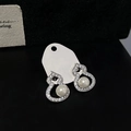 Detail of silver gourd earrings with crystals and a central white pearl on card - Silver Pin Gourd Stud Earrings / Silver