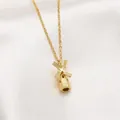 Elegant 18k gold plated necklace with detailed Dutch windmill pendant on white silk - 3D Windmill