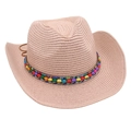 Detailed texture of beige straw cowboy hat with colorful ethnic beaded decorative band - Light Pink