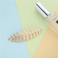 Elegant gold leaf hair clip with rhinestone detail for bridal hairstyles on pastel background - Gold Rhinestone Leaf Hair Clip (FJ005)