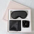 Detail view of a black silk sleep set with eye mask and scrunchie in a gift box - Black Gift Box Set (Eye Mask + Pillowcase + Scrunchie)