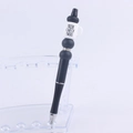 Detail of DIY beadable pen with black beads and white coffee cup silicone topper - 6#Fresh Out Of Fucks