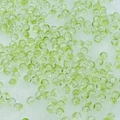 Macro detail of round light green crackle glass beads for DIY jewelry making and crafts - 6mm / Light Green