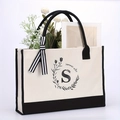 Beige katoenen canvas draagtas met zwarte letter S bloemenprint en gestreept lint - Letter-S