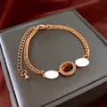 Bracelet double couche en or avec pierre oeil de tigre ovale et zircons - Or (Plaqué Or Véritable)
