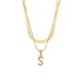 Double-layered gold chain necklace featuring an S-letter pendant with a white pearl - Letter S