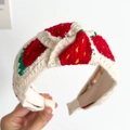 Knitted headband featuring strawberry pattern with embroidery details on cream fabric - Strawberry Knotted Knitted Headband