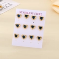 Set of six pairs of gold heart stud earrings with blue gemstones on display card - Gold/Blue