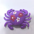 Purple crab-shaped bath toy with hollow water-draining holes and floral patterns - Floral Print Purple Crab