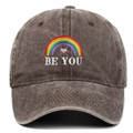Detailed view of rainbow and BE YOU embroidery on a vintage washed cotton baseball cap - One Size / Coffee
