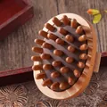 Detail of sandalwood massage brush showing 1.2cm thick wood base and rounded bristles - Beech Wood Bubble Massage Brush