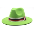Detail of a bright green fedora hat featuring a stylish red and black patterned ribbon - Fruit Green